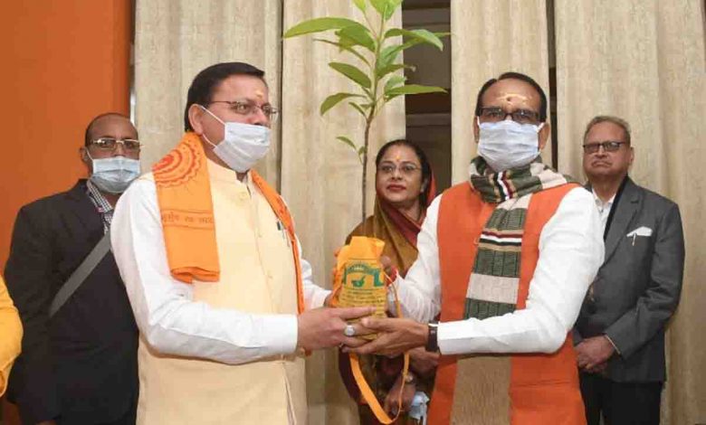 Dhami meets MP CM Shivraj Singh in Haridwar