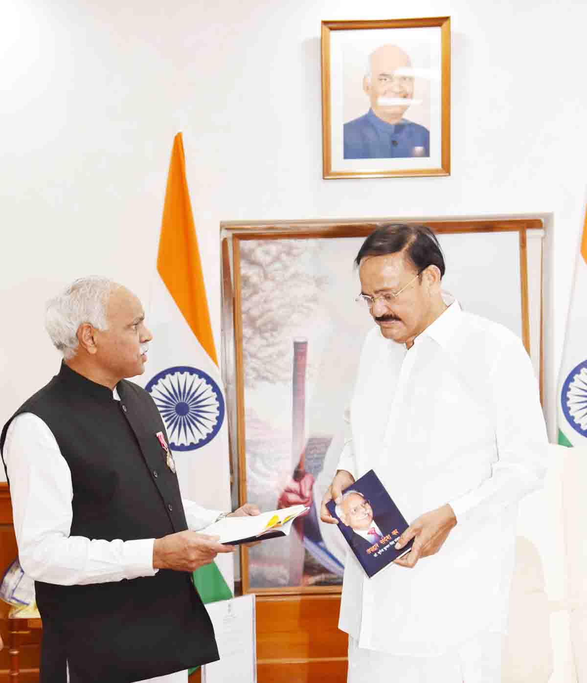Dr Sanjay presents his maiden poetry collection to Vice President
