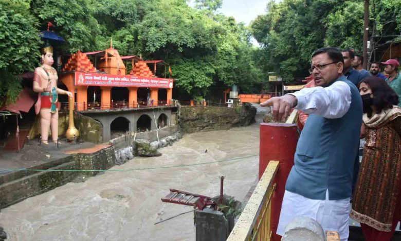 Dhami prays in Tapkeshwar after shrine flooded by raging river