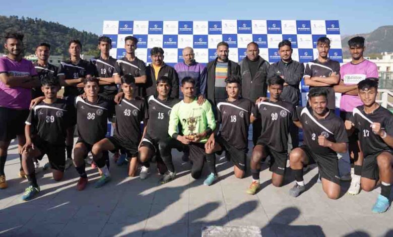 Players of Maharana Pratap Sports College pose after winning the U-18 boys football title at the SFA Championships Uttarakhand 2022 in Dehradun on Tuesday, December 13, 2022