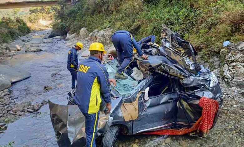car carrying marriage party falls down mountainside