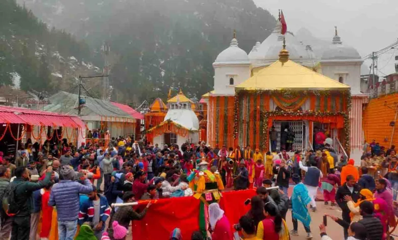 Devotees during the reopening of Gangotri temple in Uttarkashi district on Saturday