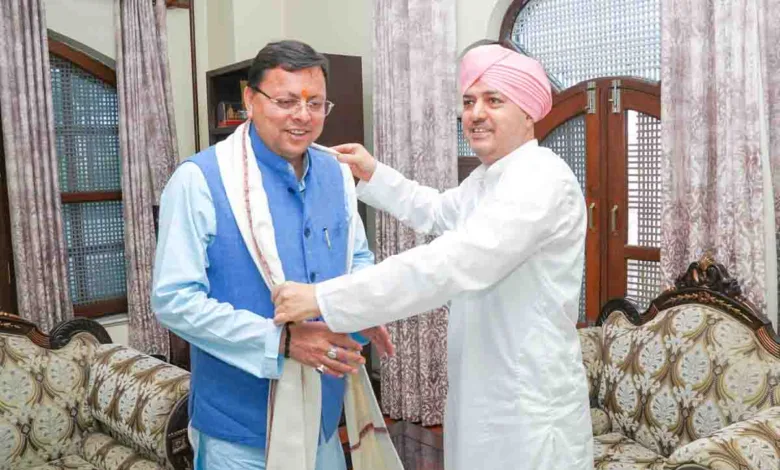 CM Dhami meets Devendra Dass, Basanti Bisht