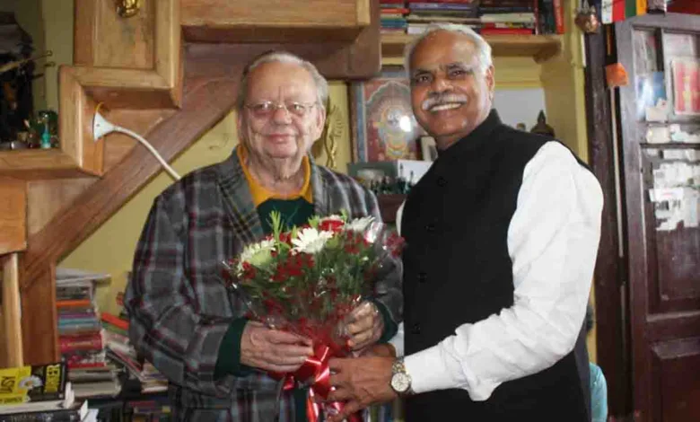 Orthopaedic surgeon Dr Sanjay presents his maiden poetry book to Ruskin Bond