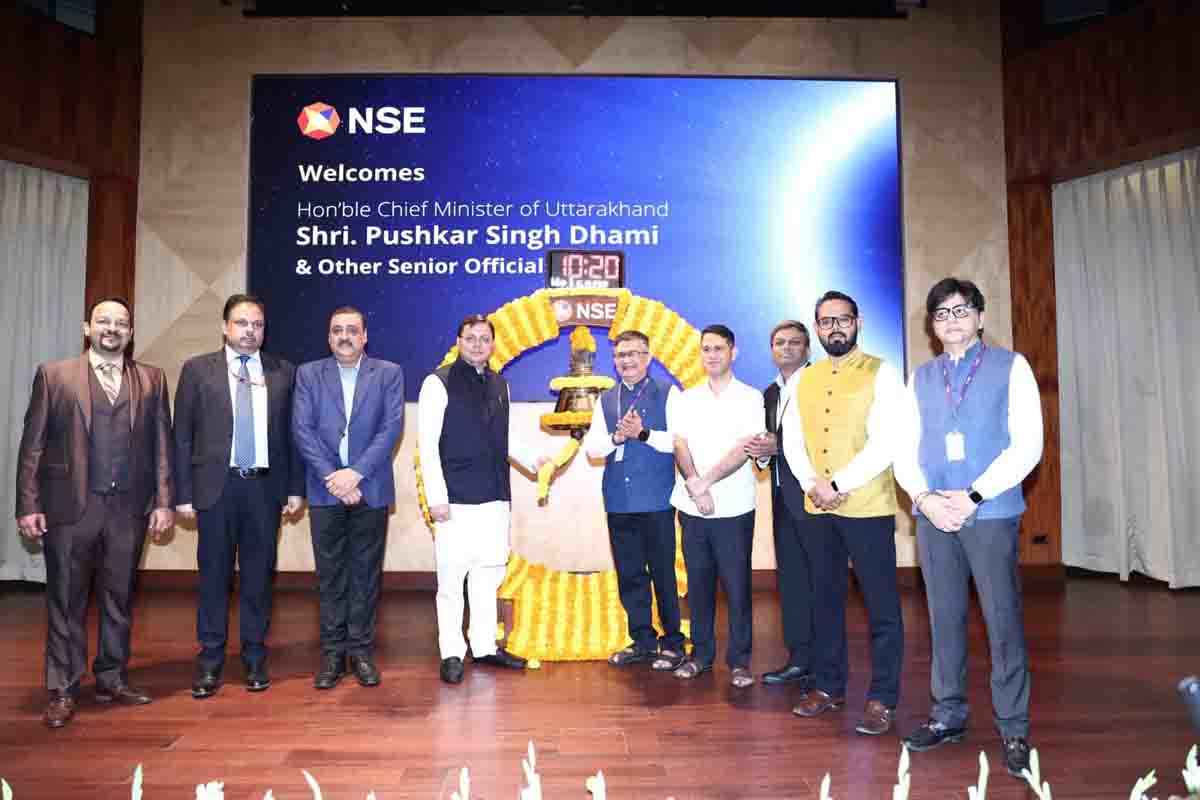 Dhami visits NSE, rings the ceremonial bell