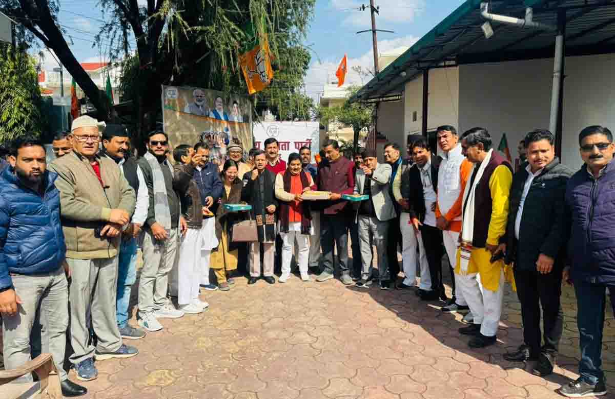 BJP members celebrate tabling of UCC bill in Assembly by distributing sweets at party's State office